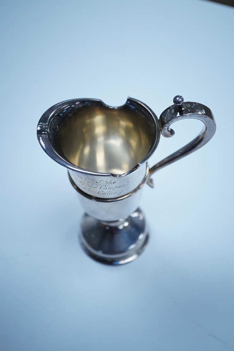 An Elizabeth II silver limited edition 'Mayflower' commemorative jug, maker P. Ltd, London. 1969, with engraved inscription and certificate of authenticity, no. 188/2000, height 14cm, 7.7oz.